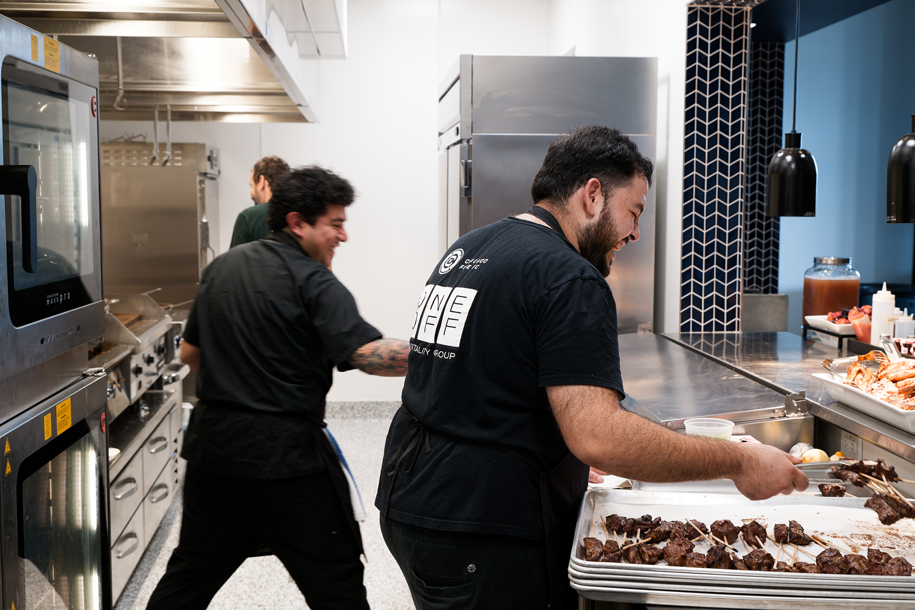 Cooks work in a kitchen