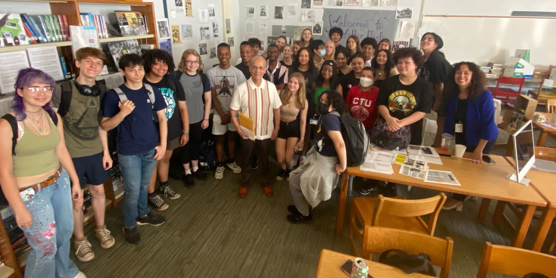 Former Young Lord member Omar Lopez with students taking part in the curriculum