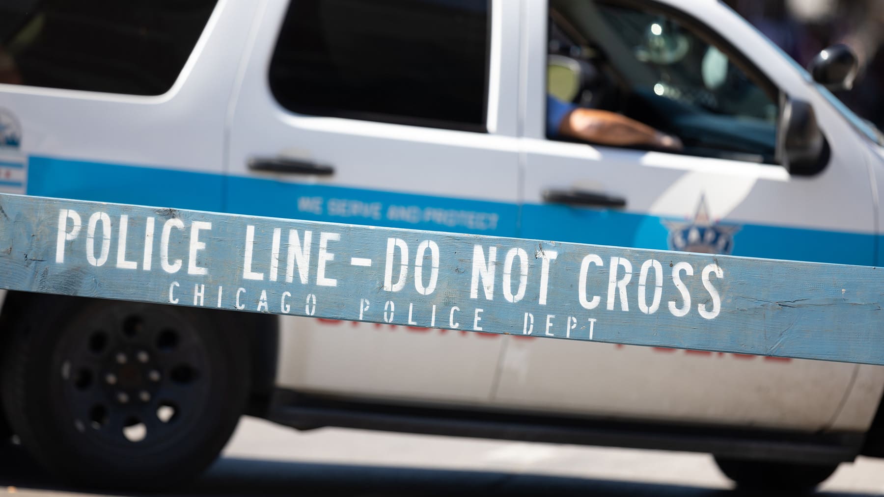 A Chicago police car and barracade horse