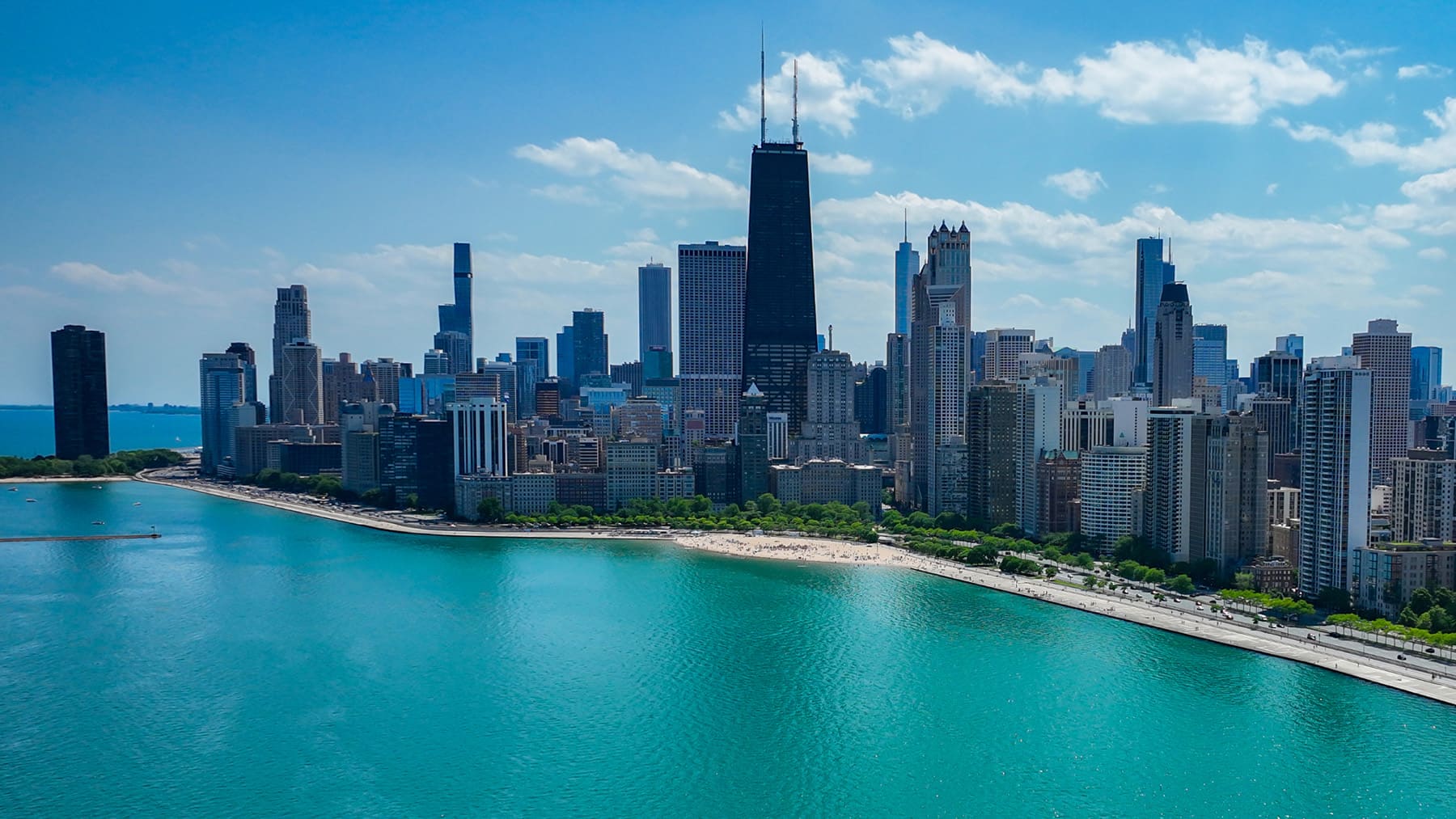 Arial view of Chicago's lakefront and downtown buiildings.