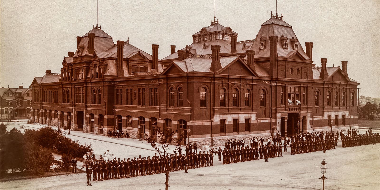 The Illinois National Guard in front of the arcade building in Pullman during Pullman Strike of 1894.
