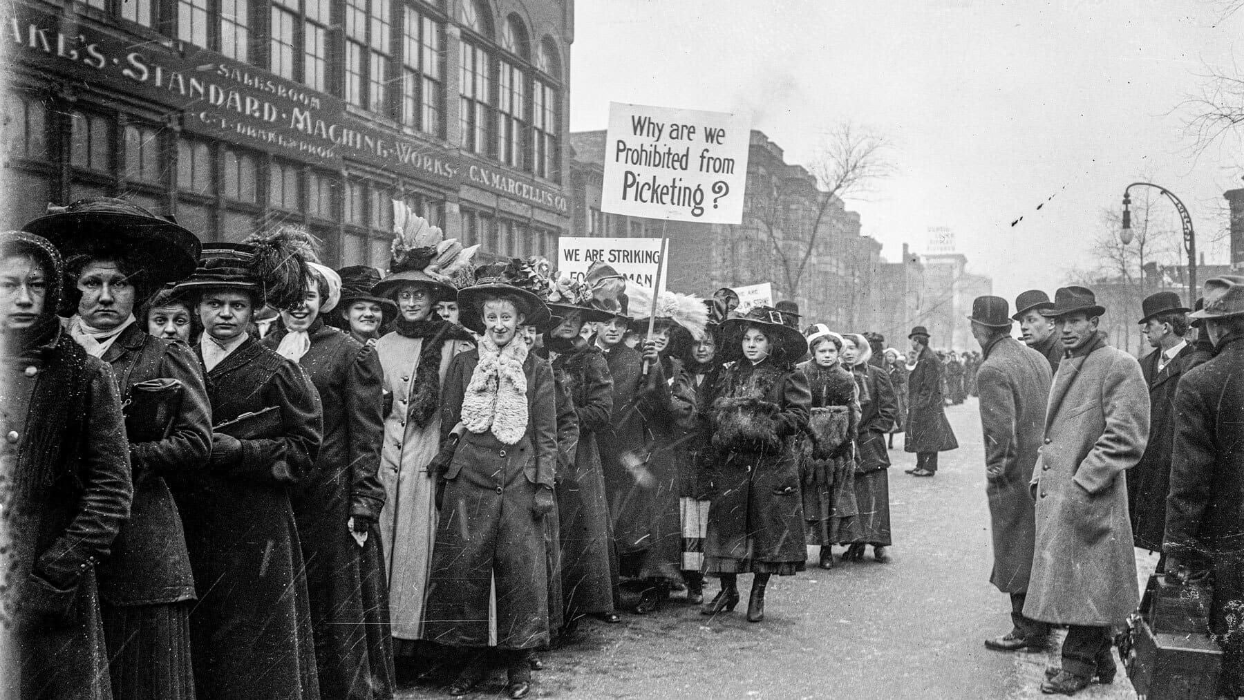 Women march in the street during the Garment Workers Strike of 1910.