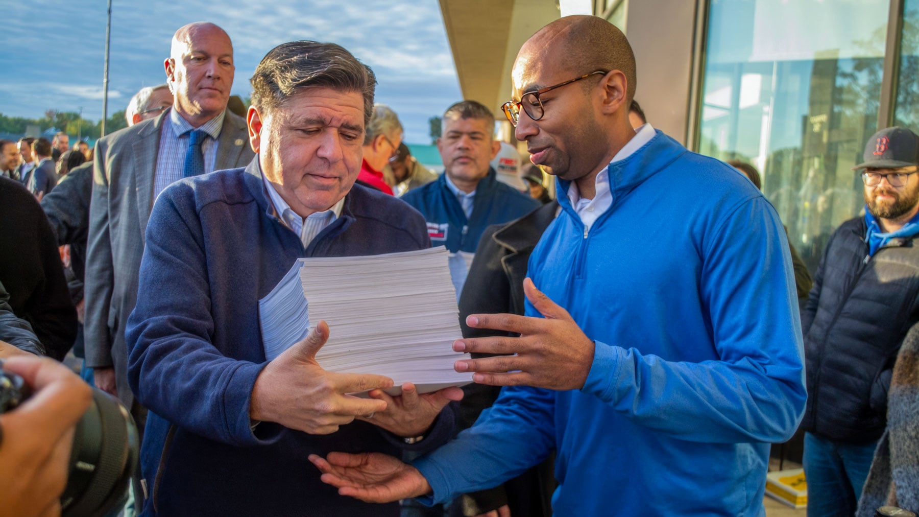 Gov. JB Pritzker and lieutenant governor candidate Christian Mitchell prepare to file nominating petitions at the Illinois State Board of Elections building in Springfield on Monday, October 27, 2025. (Jerry Nowicki / Capitol News Illinois) 