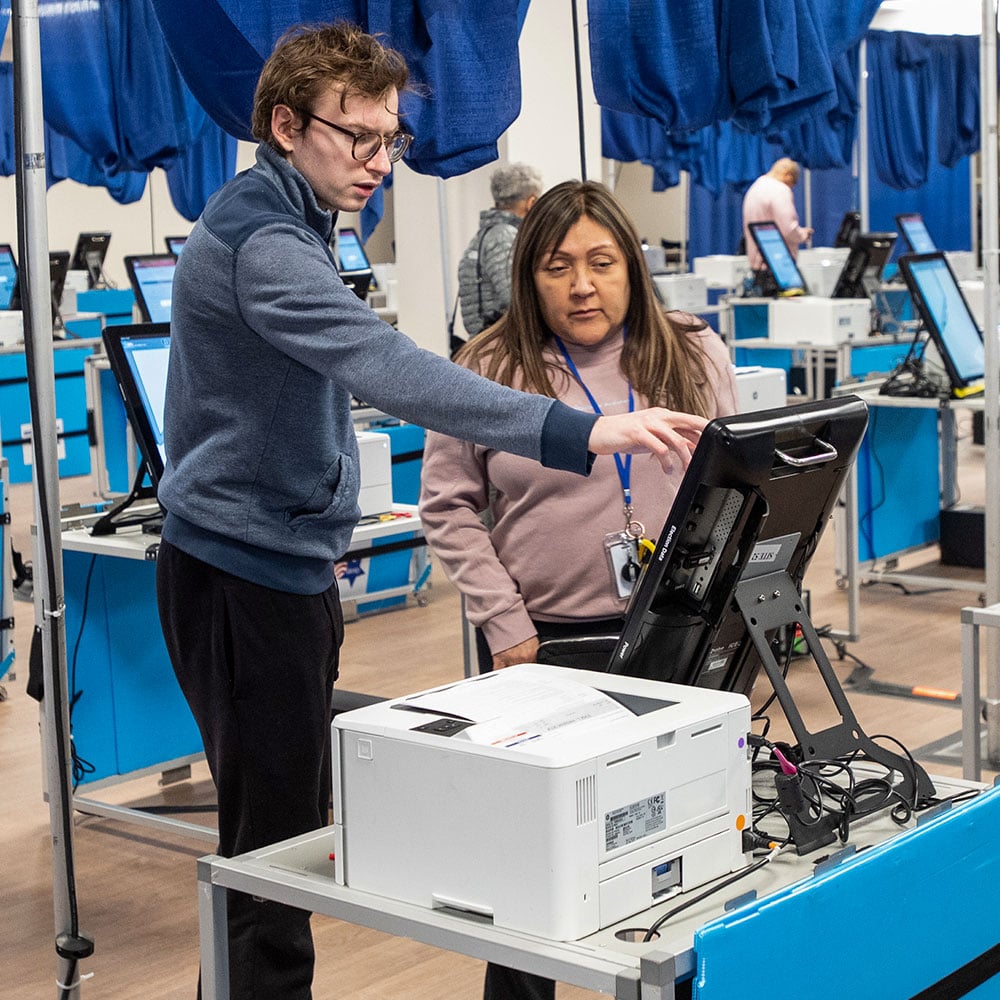 Chicago Board of Elections staff tests new equipment at the downtown early voting supersite