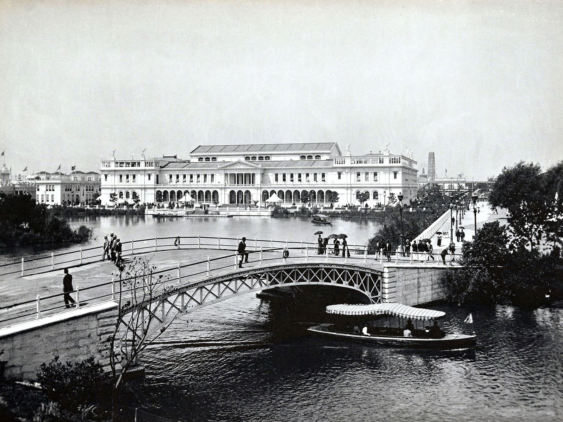 The Women’s Building, looking west across the lagoon. The northernmost tip of Wooded Island is visible on the left, and the Ferris wheel is visible to the right of the building.