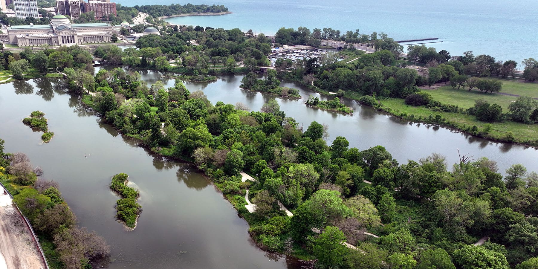 An aerial view of Wooded Island in Jackson Park, looking northeast toward Lake Michigan
