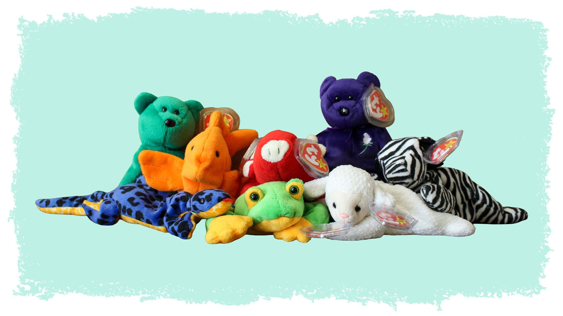 A variety of Beanie Babies, including the purple 1997 Princess Diana commemorative Beanie Baby bear