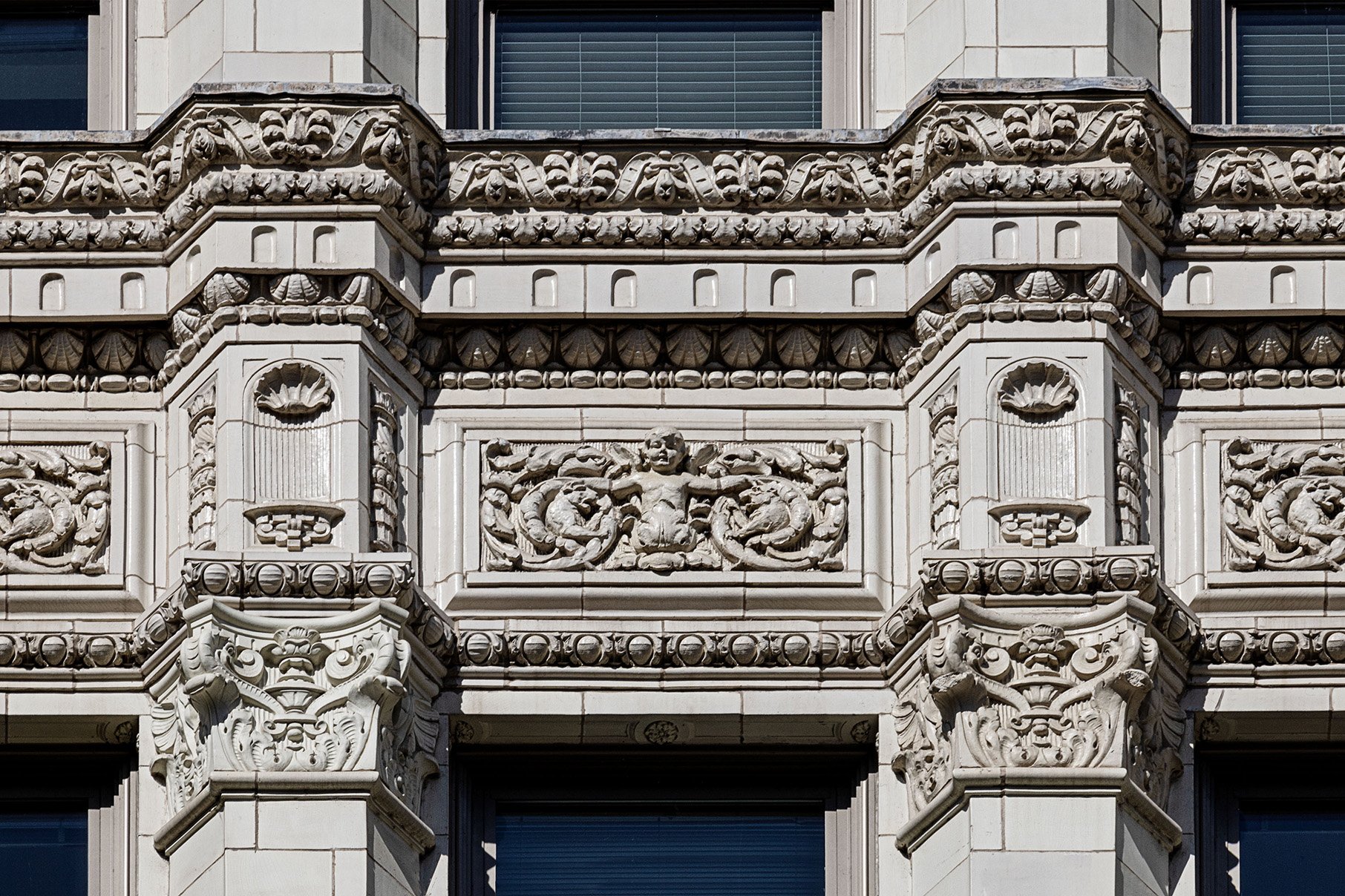 Terra cotta details between windows on Chicago's Wrigley Building