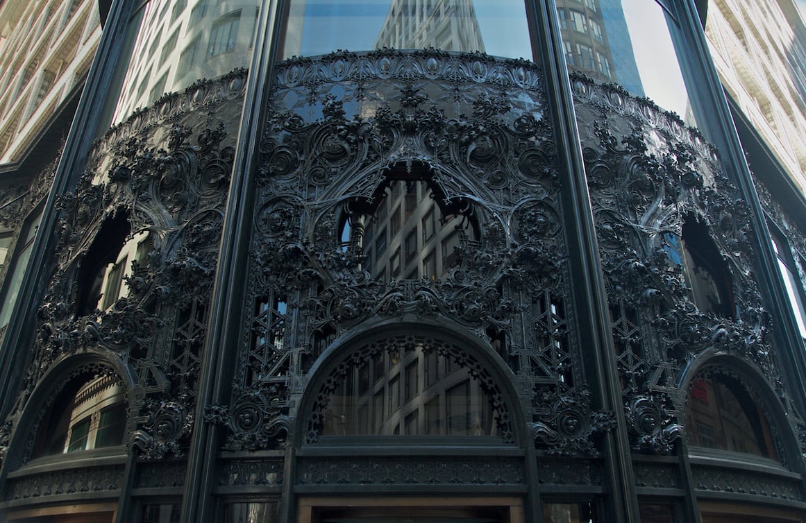 The cast iron entrance to the Carson Pirie Scott store displays Sullivan’s signature ornament. Photo credit: Alan Brunettin
