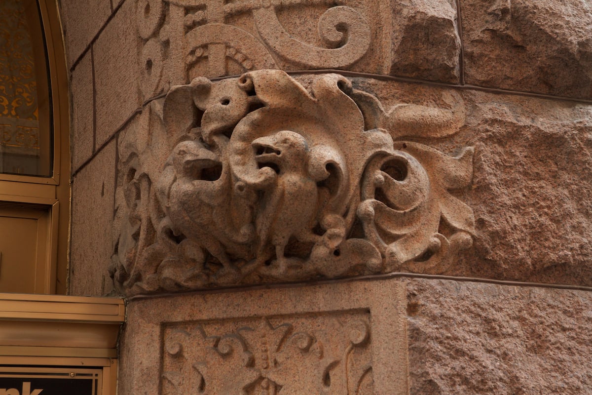 A sly nod to the building’s namesake birds, roosting in the exterior ornament Photo credit: Alan Brunettin