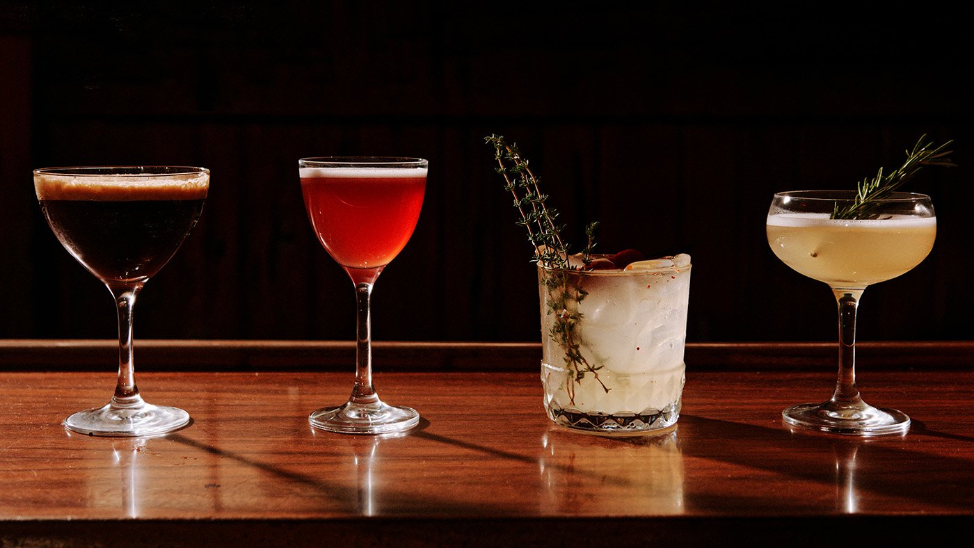 Four cocktails lined up 
