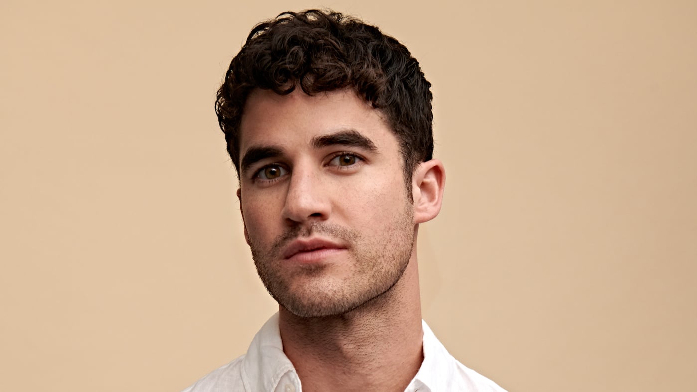 A headshot of Darren Criss