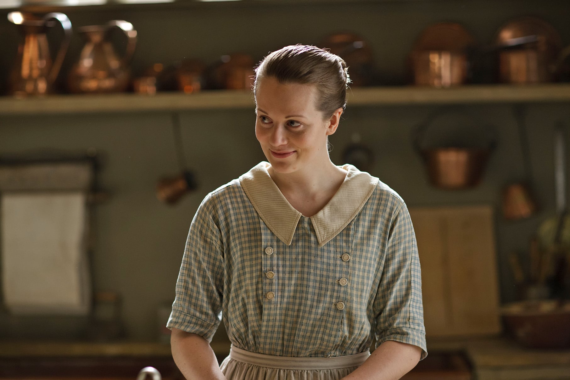 Ivy smiles in her uniform