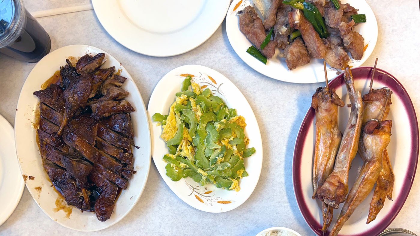 An overhead look at a spread of Cantonese food