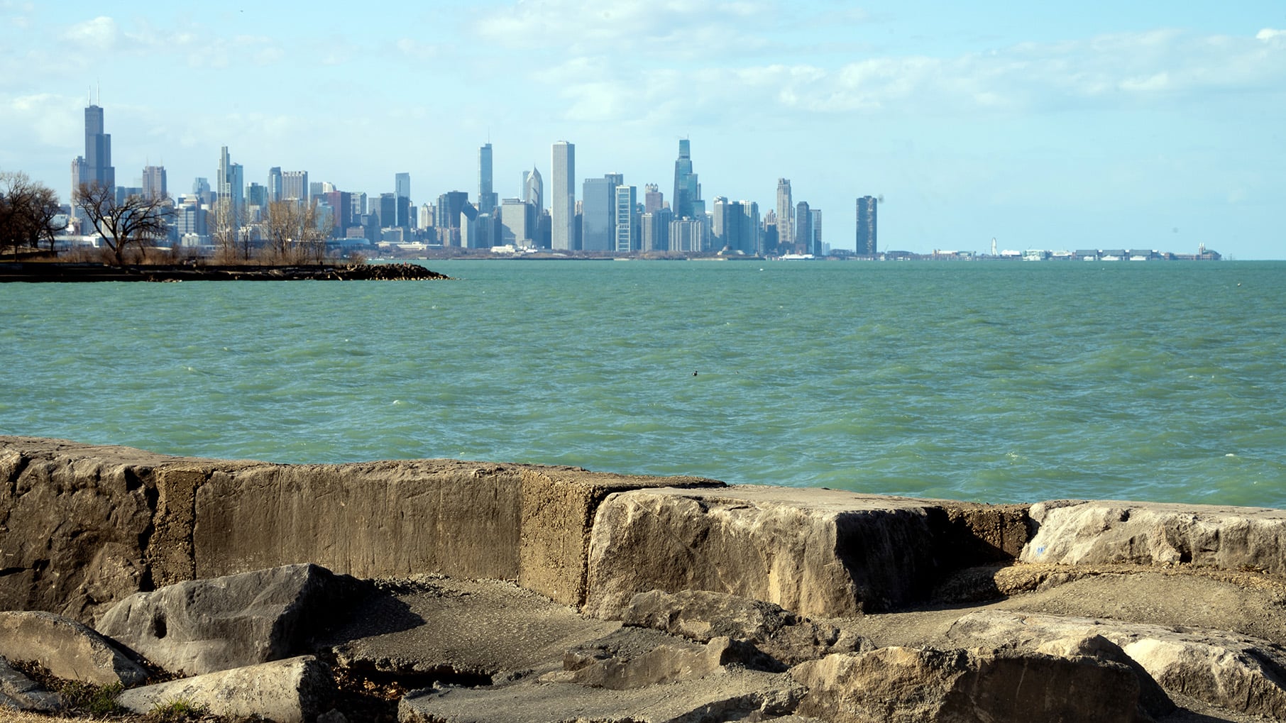 The Chicago skyline, as viewed from Promontory Point in Chicago, with limestone revetments in the foreground