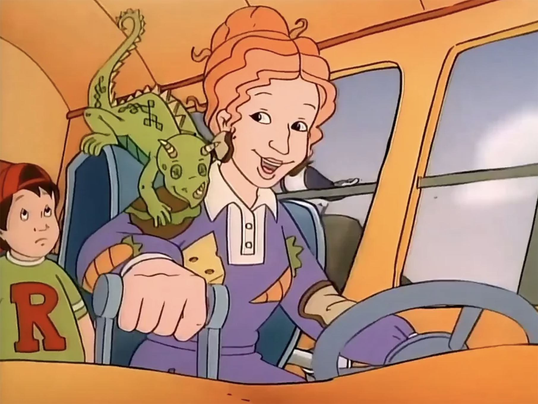 Ms. Frizzle and the lizard Liz in the Magic School Bus