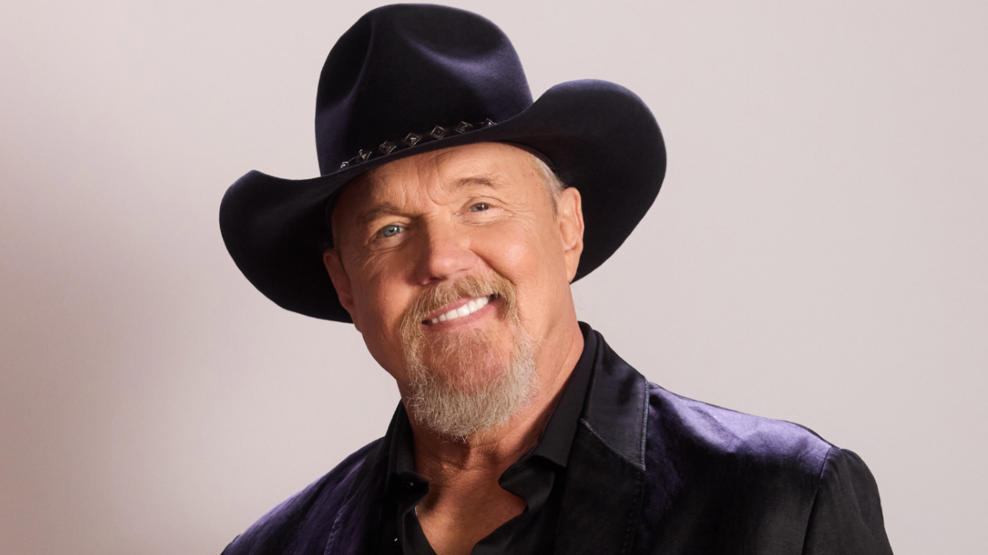 A headshot of Trace Adkins in a cowboy hat