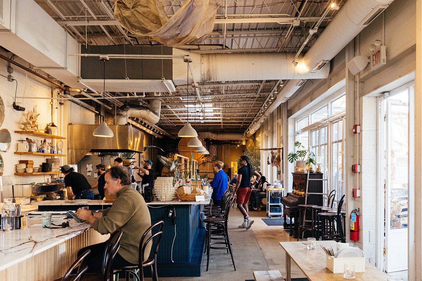 The interior of a restaurant with a bar