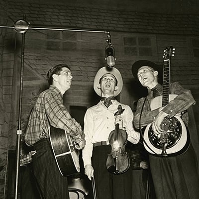 Roy Acuff (center) on the Grand Ole Opry, c.1940 Photo: Courtesy of Grand Ole Opry Archives