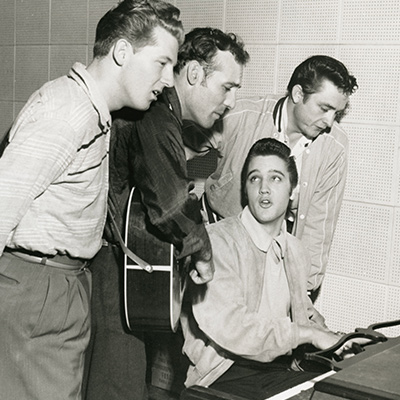 Jerry Lee Lewis, Carl Perkins, Elvis Presley,and Johnny Cash at the Sun Records studio in Memphis, 1956. Photo: Courtesy of Sam Phillips Family/Colin Escott