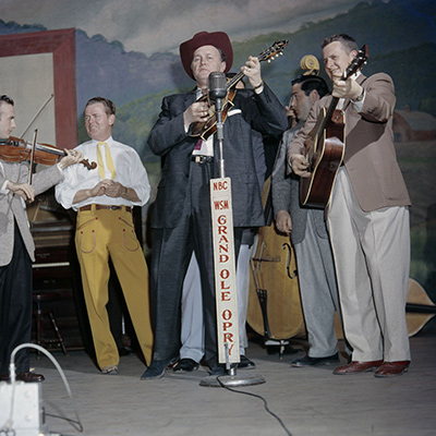 Bill Monroe on the Grand Ole Opry, Nashville, c. 1958. Photo: Courtesy of Les Leverett Collection