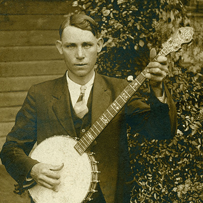 Charlie Poole shows his unique three-fingered banjo style, c.1925. Photo: Courtesy of Kinney Rorrer