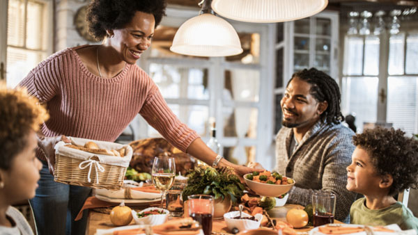 Family at Thanksgiving table.