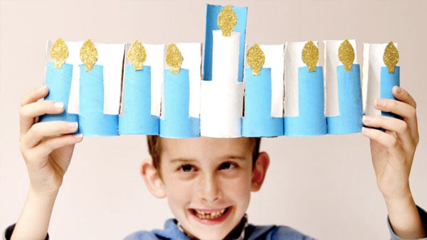 Boy with menorah.