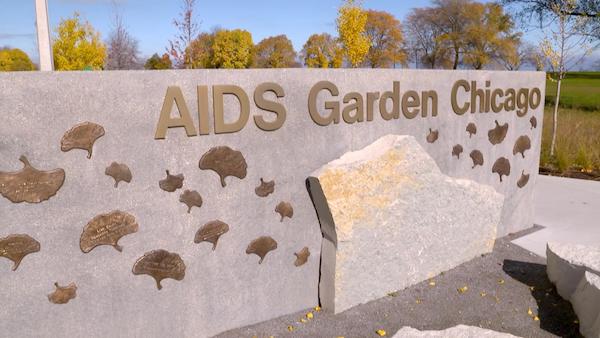 The stone sign for the AIDS Garden Chicago