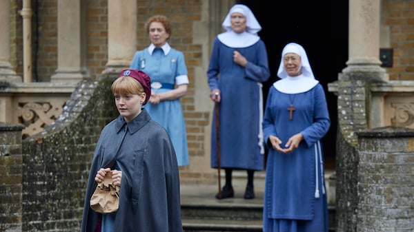 The nurses end up caring for a baby that is given up by her parents when they learn she has spina bifida. Credit: BBC Studios The midwives stand on the steps of Nonnatus House