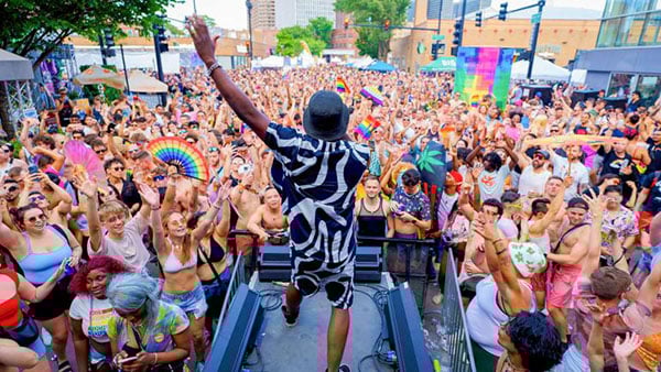Chicago Pride Fest 2024. Credit: Steve Koch / Northalsted A crowd of people cheering on a person on stage at Chicago Pride Fest