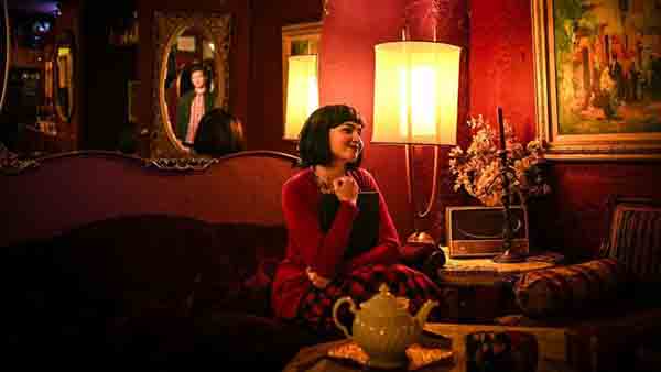 ‘Amélie’ opens at the Chopin Theatre and runs through Sept. 28, 2025. (Collin Quinn Rice) A woman portraying Amélie on stage at the Chopin Theater