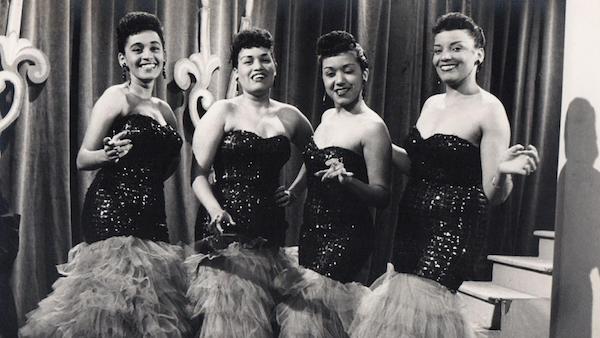 Cuarteto D'Aida. Credit: Voces: Omara Four women performers on a stage in a black and white photo