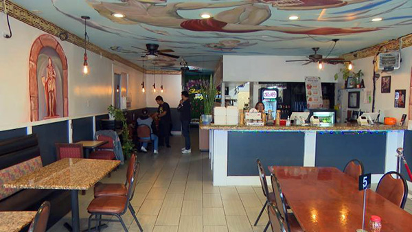 The interior of a mostly empty restaurant