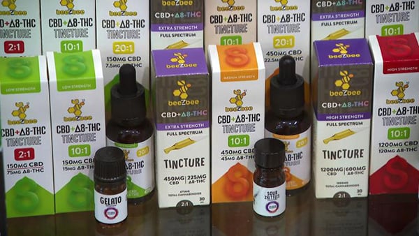 Bottles and boxes of hemp-derived "tinctures" lined up 