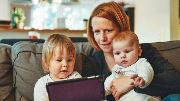 Mom and kids watching program