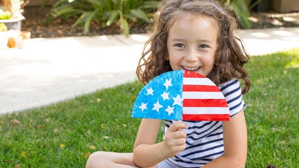 Child with homemade fan