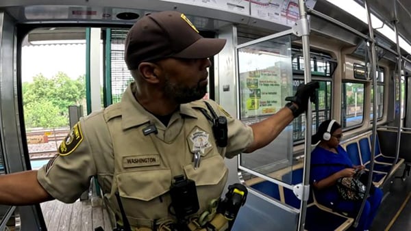 A Cook County officer on a CTA train 