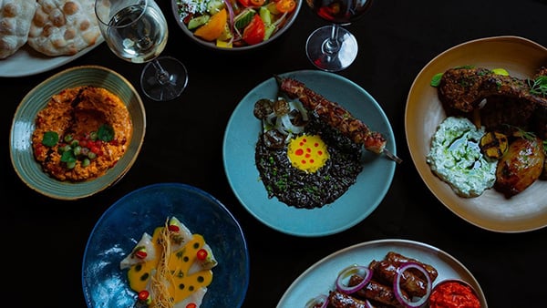 A spread of plates with various dishes on them