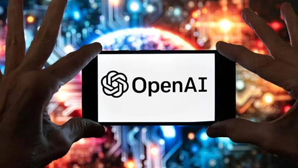 Hands hold up a horizontal phone screen with the OpenAI logo on it. 