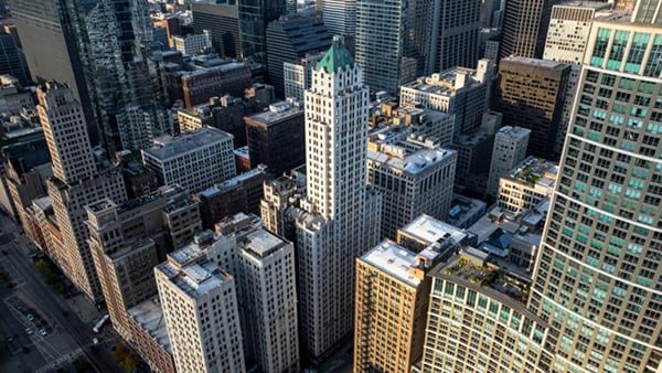 An aerial view of Chicago's Pittsfield Building, surrounded by other downtown high rises