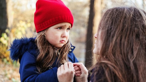 Worried child with mom