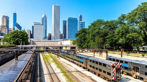 The Grant Park Metra tracks in the foreground with Chicago skyscrapers in the background