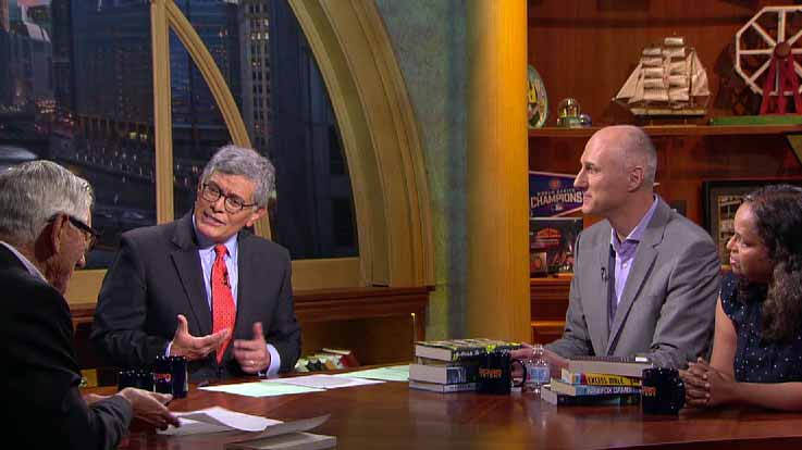 Chicago Tonight guests at a table with host Phil Ponce