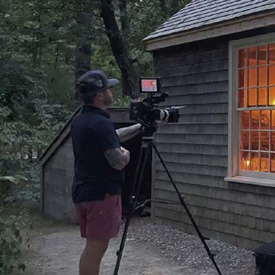A behind-the-scenes image from Henry David Thoreau, filming at the replica of Thoreau's cabin at Walden Pond. Credit: Ewers Brothers Productions
