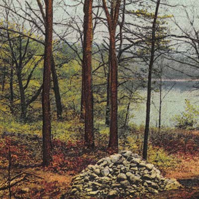 A vintage postcard depicting the site of Thoreau's hut at Walden Pond. Credit: Public Domain