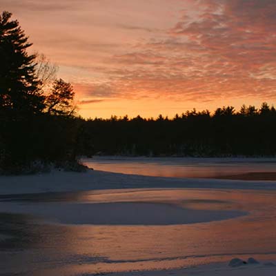 A still image from Henry David Thoreau, picturing Walden Pond during winter. Credit: Ewers Brothers Productions
