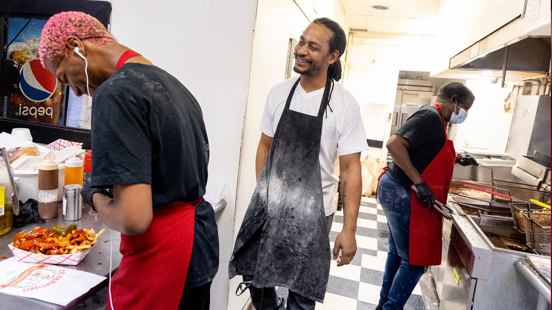 Anthony Hampton laughing in the kitchen
