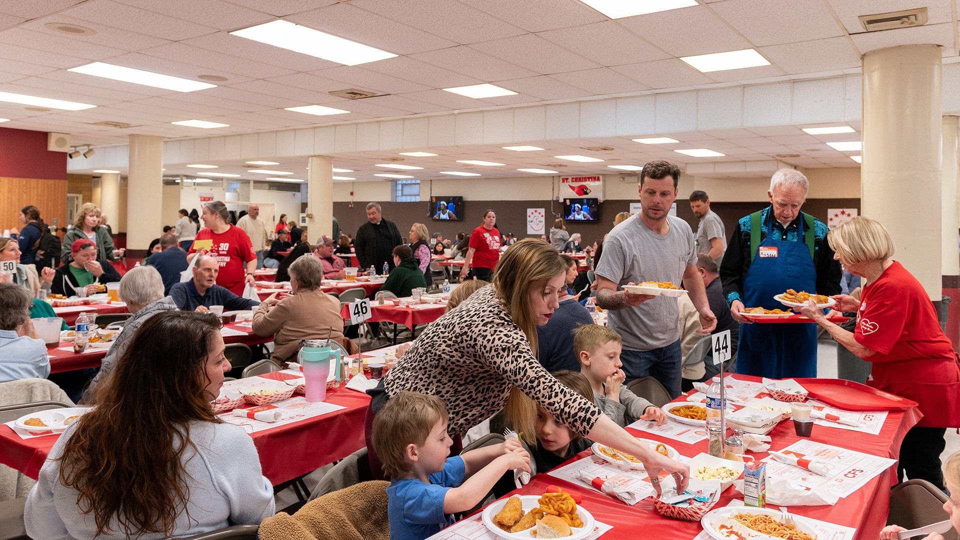 The tables at St. Christina's filled with people