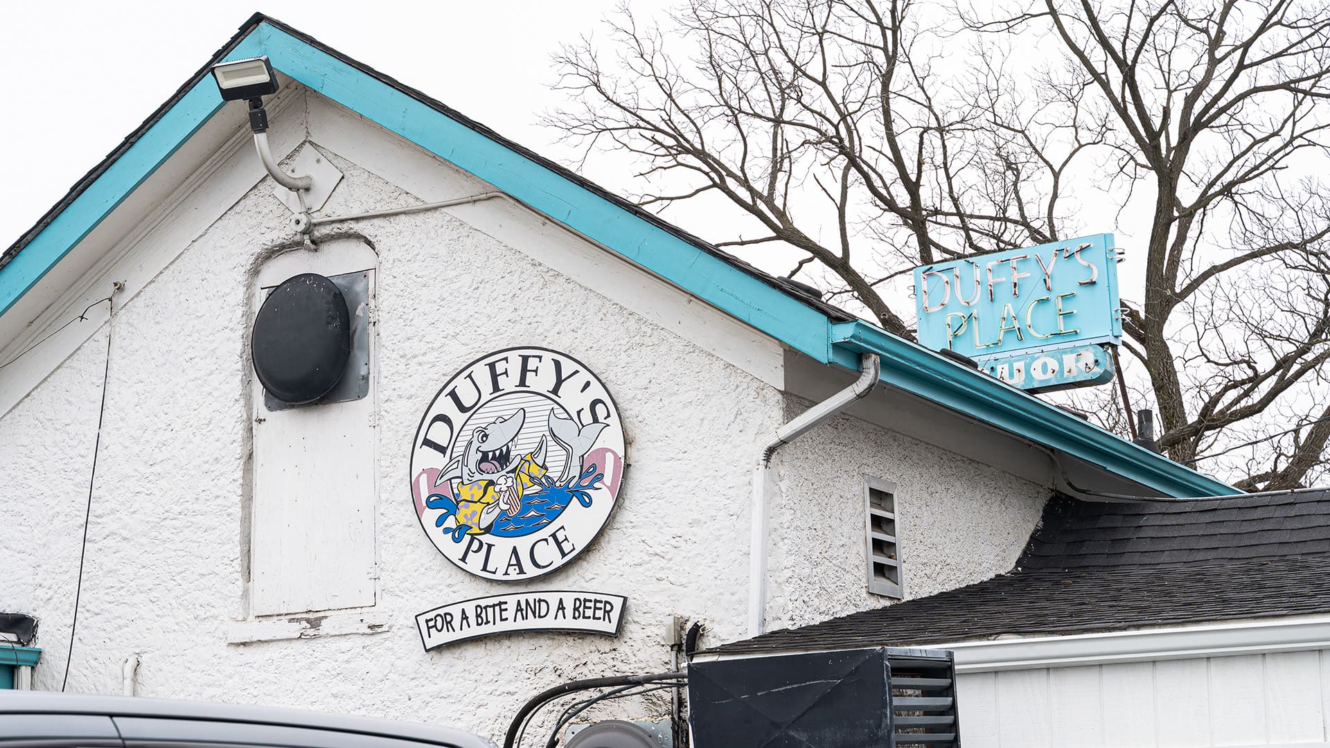 The exterior of Duffy's Place showing thier logo. width=